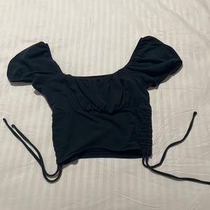 Black crop top with ruffle sleeves